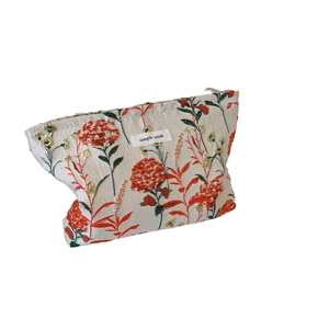 Minimalist cream canvas makeup bag with floral embroidery and simple wish label