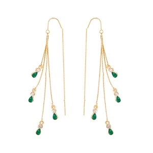 Detail of long gold drop tassel earrings with green teardrop and white round gemstones