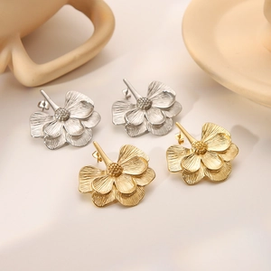 Elegant 18k gold and silver plated flower stud earrings with detailed metallic petals
