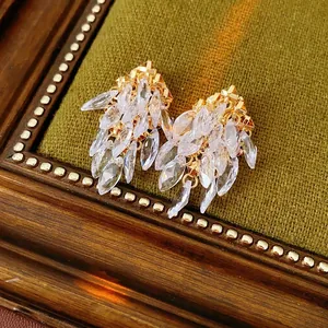 Boucles d'oreilles pampilles losanges avec zircons marquise sur monture dorée chic