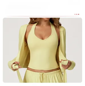Detail of light yellow yoga set showing high-stretch fabric and one-piece seamless tailoring