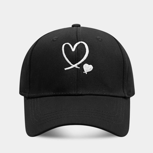 Classic black baseball cap with white heart embroidery and curved brim for couples