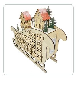 Close-up of wooden Christmas sled advent calendar with 24 numbered drawers and LED lights