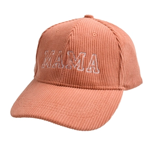 Detail of MAMA white embroidery on coral corduroy baseball cap with ribbed texture