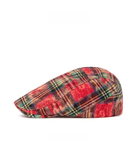 Close-up of vintage red plaid ivy cap showing detailed texture and side profile view