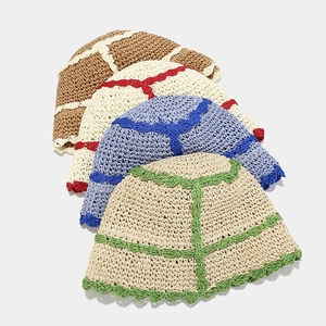 Two-tone crochet straw bucket hats for women in four color combinations with wavy brims