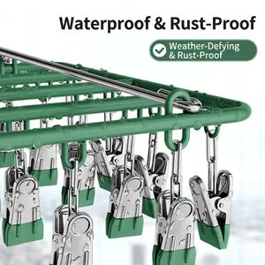 Waterproof and rustproof stainless steel clothes drying rack with green clips
