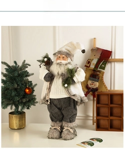 Close-up of Santa Claus ornament in grey knit fabric with fur collar and gift bag