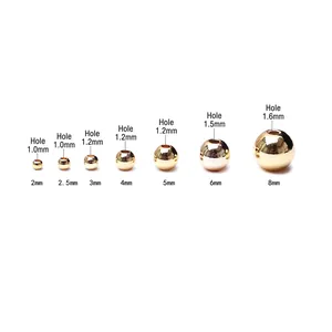 Polished 14k gold-filled round copper spacer beads for jewelry making in various sizes