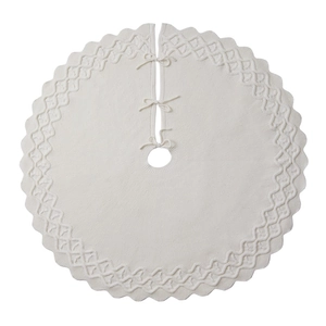 Knitted Christmas tree skirt in cream white with cable knit texture and tie closure