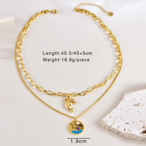Détails du collier double rang doré avec pendentifs dauphin et palmier et mesures