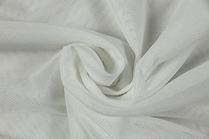 Close-up of white mesh fabric texture showing fine breathable polyester material detail