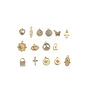 Selection of gold-plated zinc alloy charms with rhinestones for DIY jewelry making