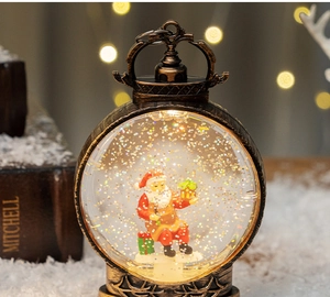 Macro detail of a bronze Christmas lantern with Santa Claus and swirling golden glitter