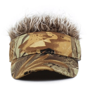 Detail of camouflage baseball cap with brown curly hair toupee wig attached on top