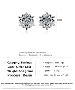 Detail view of 15mm black enamel snowflake earring with cubic zirconia accents
