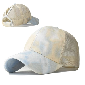 Detail of tie-dye ponytail sun hat with breathable mesh back and adjustable velcro strap
