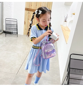 Toddler girl wearing purple laser backpack with bunny ears and sparkling sequins