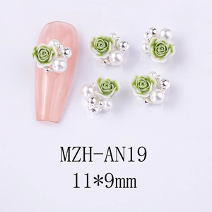 Macro detail of 3D rose nail charms with gradient resin petals and white pearls