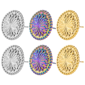 Detailed close-up of sunburst pattern earrings in silver, gold and rainbow finishes