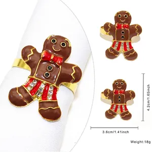 Detail view of gingerbread man napkin ring with metal enamel finish and dimensions