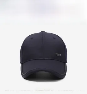 Detail of navy blue baseball cap featuring a metallic CHINA logo on the side panel