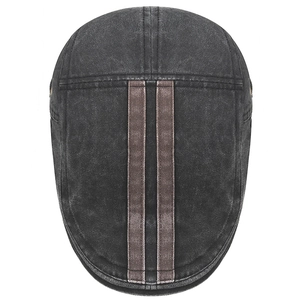 Vintage dark grey washed denim flat cap with brown strap details from top view