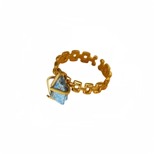 Adjustable gold titanium steel ring featuring a chain-link band and blue natural stone heart