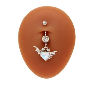 Silver bat wing belly ring with heart opal and round zircon shown on navel model