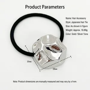 Elastic black hair tie with polished silver wavy metal charm for women's hairstyles