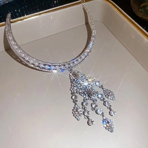 Luxury silver-toned tassel necklace with sparkling rhinestones and white pearls