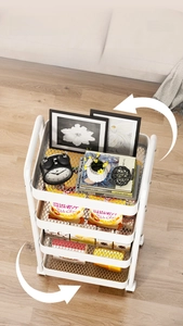 Close-up of a white 4-tier rolling cart with mesh baskets and smooth swivel wheels