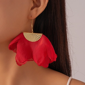 Detailed shot of red layered chiffon flower earrings with textured gold hammered metal