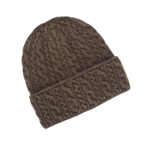 Detailed view of dark brown cable-knit winter beanie with thick ribbed cuff for warmth