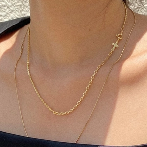 Minimalist 925 sterling silver layered cross necklace with golden finish for women