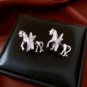 Silver horse stud earrings with sparkling cubic zirconia on a premium leather box