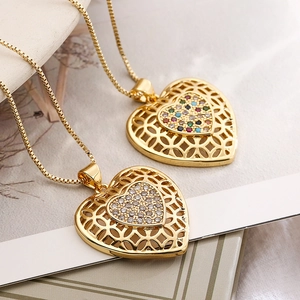Gold hollow heart pendant necklaces with colorful rhinestones on elegant box chains