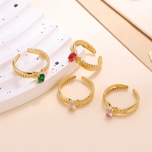 Adjustable gold plated rings with braided bands and colorful oval cubic zirconia stones