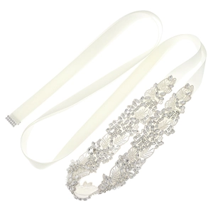 Elegant bridal belt with silver crystals and beads on a white satin ribbon for wedding gowns