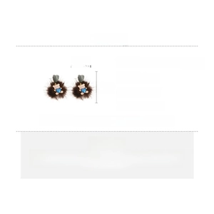 Detail view of resin bear and pompom earrings showing 5x4cm dimensions and materials