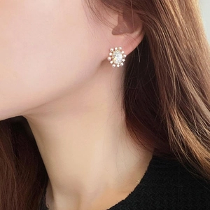 Elegant gold plated sunflower stud earrings with pearls and sparkling zircon stones