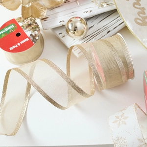 Champagne gold sheer ribbon with glitter edges for Christmas gift wrapping and decor
