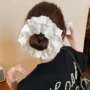 Elegant white double-layer lace scrunchie with floral embroidery for elegant hair styling