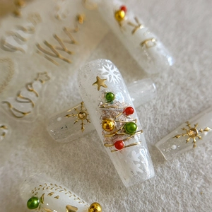 Christmas gradient press-on nails with 3D snowman, tree, and snowflake gold decorations