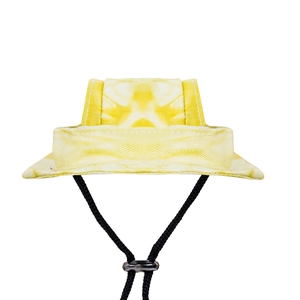 Detail of yellow tie-dye pet sun hat with adjustable cord and twill canvas texture