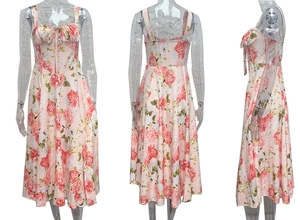 Detail view of pink floral midi dress with ruched drawstring neckline and backless design