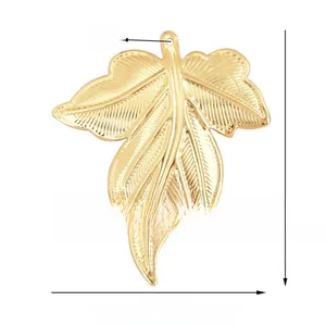 Detailed view of a golden maple leaf charm pendant with intricate vein textures for DIY