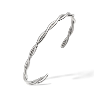 Detail of silver twisted open bangle showing polished metal texture and minimalist design