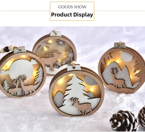 Close-up of lighted wooden Christmas deer ornament with warm LED forest design