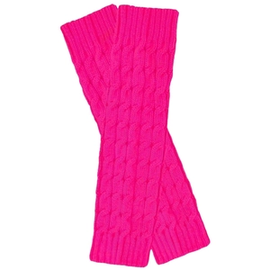 Detail of hot pink cable knit leg warmers showing thick textured yarn and weave